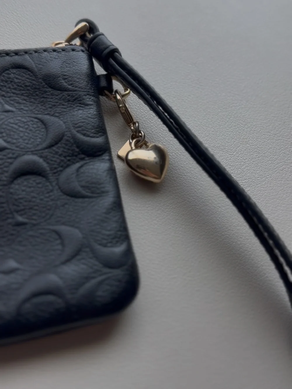 Coach Black Embossed Signature Wristlet with Gold Logo